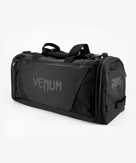 Venum Trainer Lite Evo Sports Duffle Bag Black 2 Venum Trainer Lite Evo Sports Duffle Bag in a fitness setting