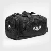 Venum Trainer Lite Sports Duffel Bag Black Camo 1 Venum Trainer Lite Sports Duffel Bag in a studio setup