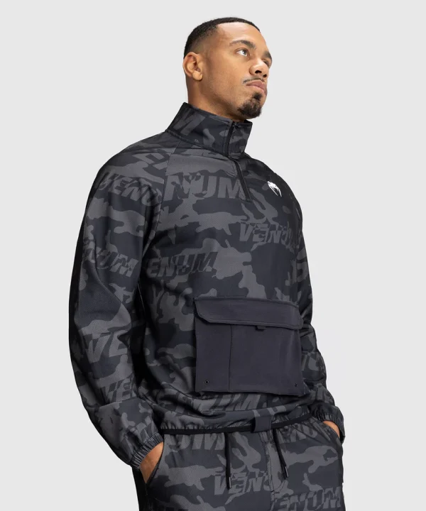 Venum Trooper Mens Half Zip Jacket Black Charcoal 1 Man wearing Venum Trooper Men's Half-Zip Jacket