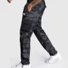 Venum Trooper Mens Tracksuit Bottoms Pants Black Charcoal 2 Man wearing Venum Trooper Men's Tracksuit Bottoms Pants