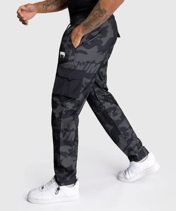 Venum Trooper Mens Tracksuit Bottoms Pants Black Charcoal 2 Man wearing Venum Trooper Men's Tracksuit Bottoms Pants