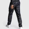 Venum Trooper Mens Tracksuit Bottoms Pants Black Charcoal 3 Man wearing Venum Trooper Men's Tracksuit Bottoms Pants