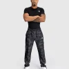 Venum Trooper Mens Tracksuit Bottoms Pants Black Charcoal 5 Man wearing Venum Trooper Men's Tracksuit Bottoms Pants