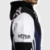 Venum X Tekken 8 Jin Kazama Hoodie Blue Black White 5 Man wearing a Venum x Tekken 8 Jin Kazama Hoodie