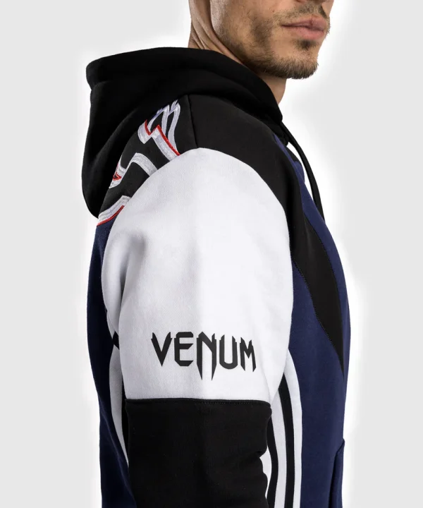 Venum X Tekken 8 Jin Kazama Hoodie Blue Black White 5 Man wearing a Venum x Tekken 8 Jin Kazama Hoodie