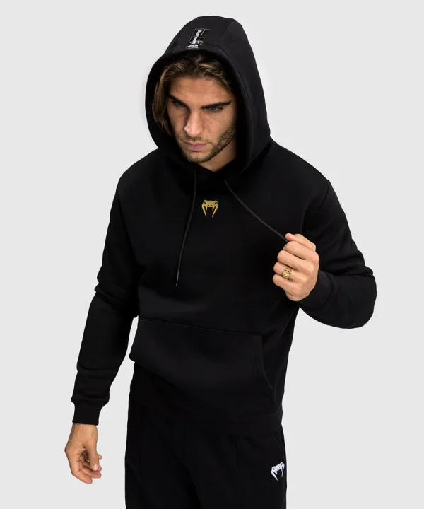 Venum X Tekken 8 Marshall Law Hoodie Black Red Gold 2 Venum x Tekken 8 Marshall Law Hoodie against a plain background