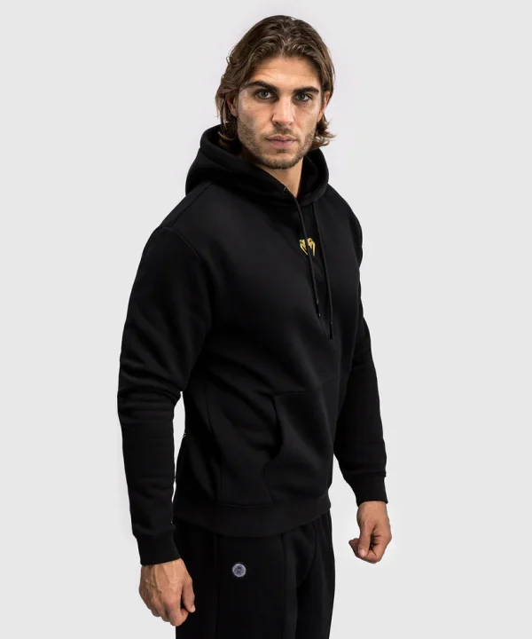 Venum X Tekken 8 Marshall Law Hoodie Black Red Gold 3 Stylish Venum x Tekken 8 Marshall Law Hoodie in black with vibrant color decals