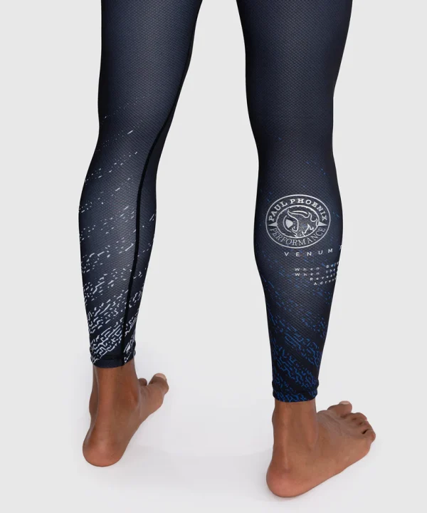 Venum X Tekken 8 Paul Phoenix Spats Compression Tights Black Blue 6 Man wearing Venum x Tekken 8 Paul Phoenix Spats Compression Tights