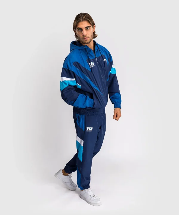 Man wearing Venum x Top Rank Original Men's Hooded Tracksuit Jacket