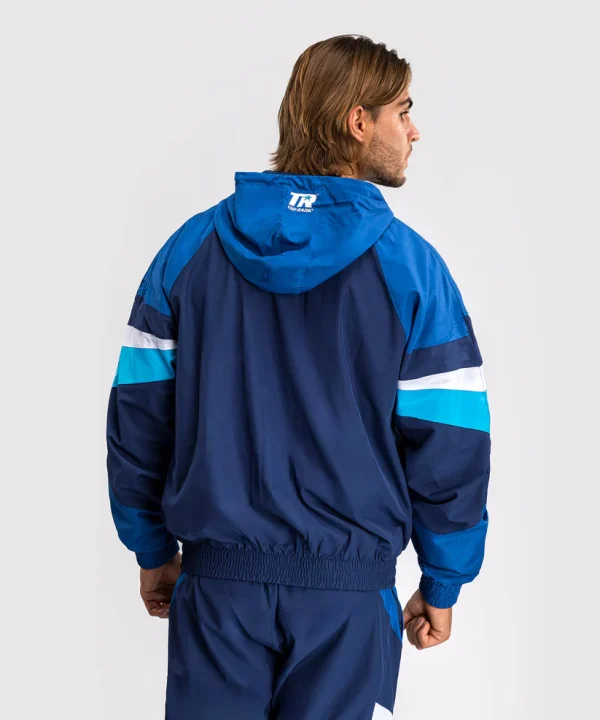 Man wearing Venum x Top Rank Original Men's Hooded Tracksuit Jacket