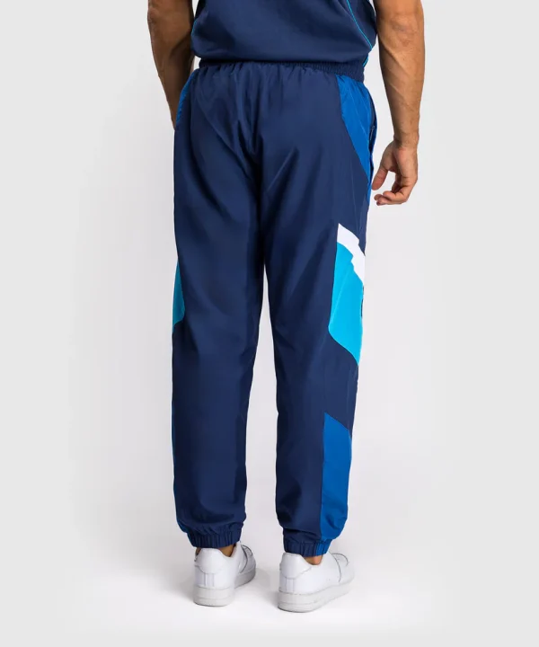 Man wearing Venum x Top Rank Original Men's Tracksuit Pants