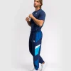 Man wearing Venum x Top Rank Original Men's Tracksuit Pants