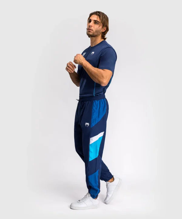 Man wearing Venum x Top Rank Original Men's Tracksuit Pants