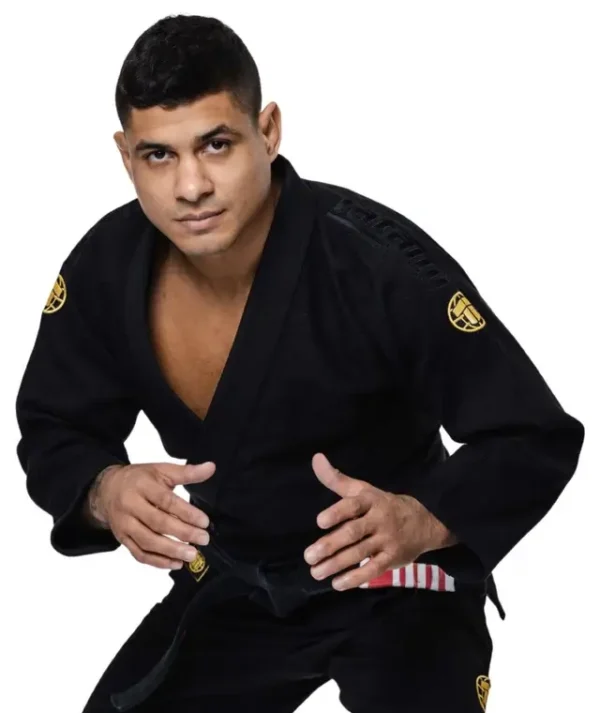 Man wearing Tatami Fightwear Estilo Gold Label BJJ Gi, posed in a fighting stance.