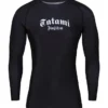 Athlete wearing the stylish 'Tatami Fightwear Gothic Rashguard' for extreme sports training.