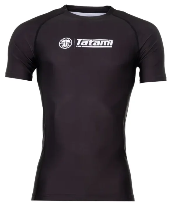 Man wearing the 'Tatami Fightwear Impact Rashguard' during an intense martial arts training session.