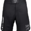Athlete wearing Tatami Fightwear Kanagawa Shorts in striking black and white design
