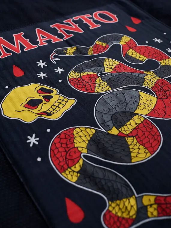Manto Coral BJJ Gi on display