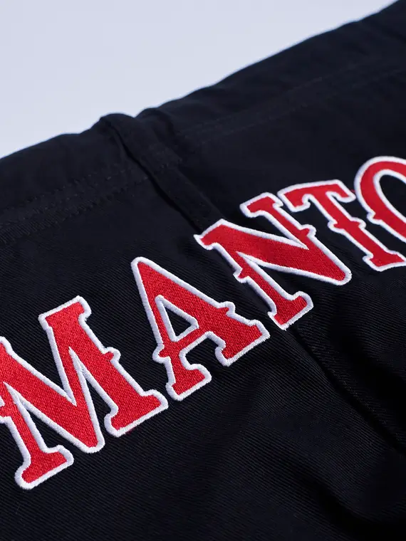Man wearing Manto Coral BJJ Gi