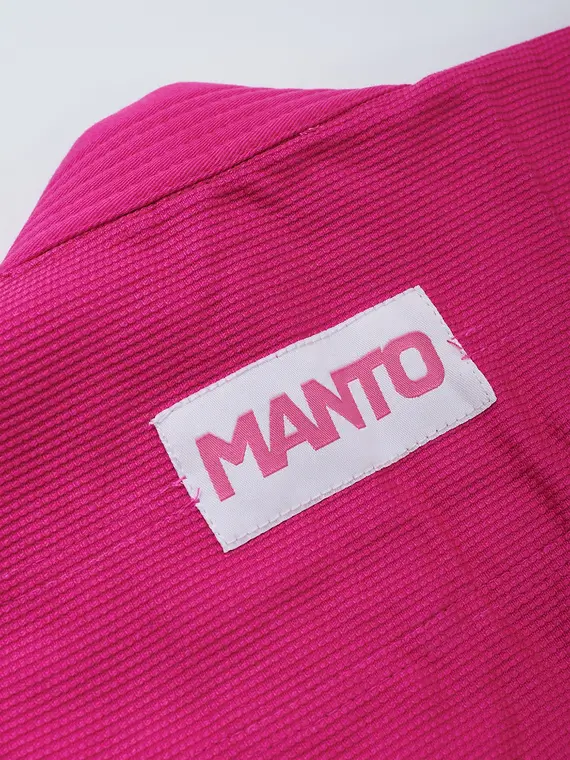 Manto Junior 2.0 Kids Youth BJJ Gi in action Young martial artist wearing Manto Junior 2.0 Kids Youth BJJ Gi
