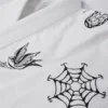 Manto Miko BJJ Gi in white color on a hanger
