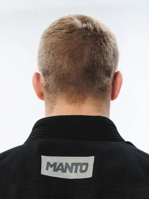 Man wearing Manto Rise 2.0 BJJ Gi