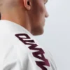 Man in Manto X5 BJJ Gi demonstrating a grappling move