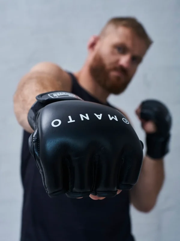 Manto Impact MMA Gloves - Ultimate Protection with style Man wearing the Manto Impact MMA Gloves