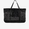 Stylish Manto Society Mesh Bag in a modern environment.