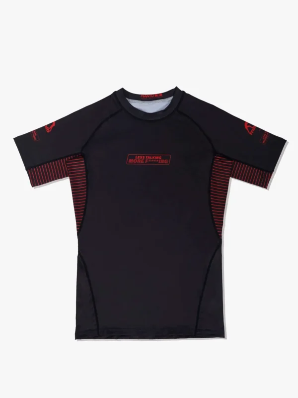 Manto Less Talking More Fighting Rash Guard in a striking design