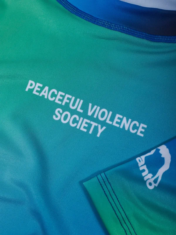 A Manto Society Gradient Rash Guard with vibrant colors.