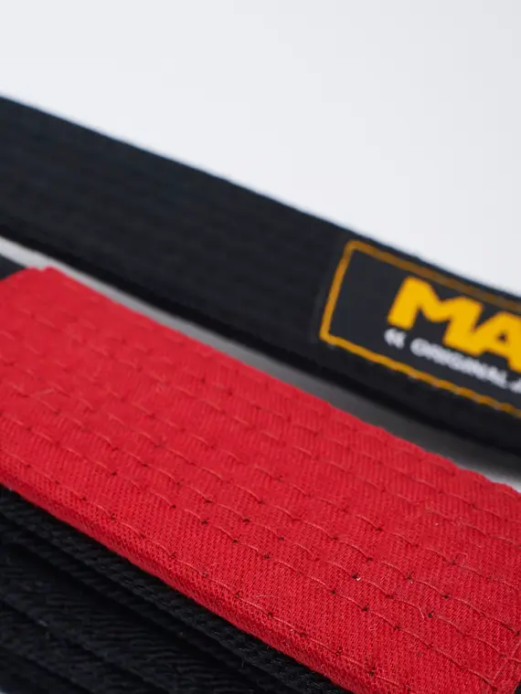 Blue Manto Original BJJ Belt neatly placed on white surface.