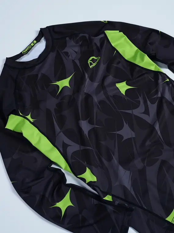 Manto Terra Long Sleeve Rash Guard on a white background