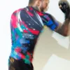 Manto Rave Rashguard Athletic Product Image A man wearing Manto Rave Rashguard during a workout