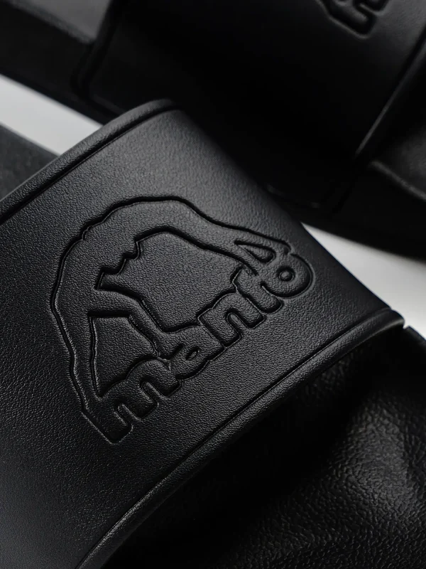 Black Manto Blackout Logo Slides on a white background