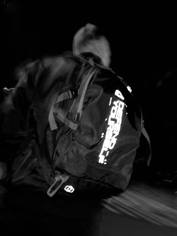 Black Manto Cross Backpack in white background