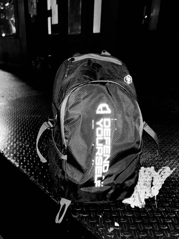 Black Manto Cross Backpack on a white background