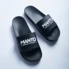 Manto Defend Slides in different colors on a neutral background.