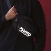 Manto Defend Waist Bag Black 6 A man wearing the Manto Defend Waist Bag around his waist.