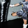 Pair of Manto Disobey Fight Shorts on white background