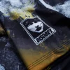 Person wearing Manto Disobey Rash Guard