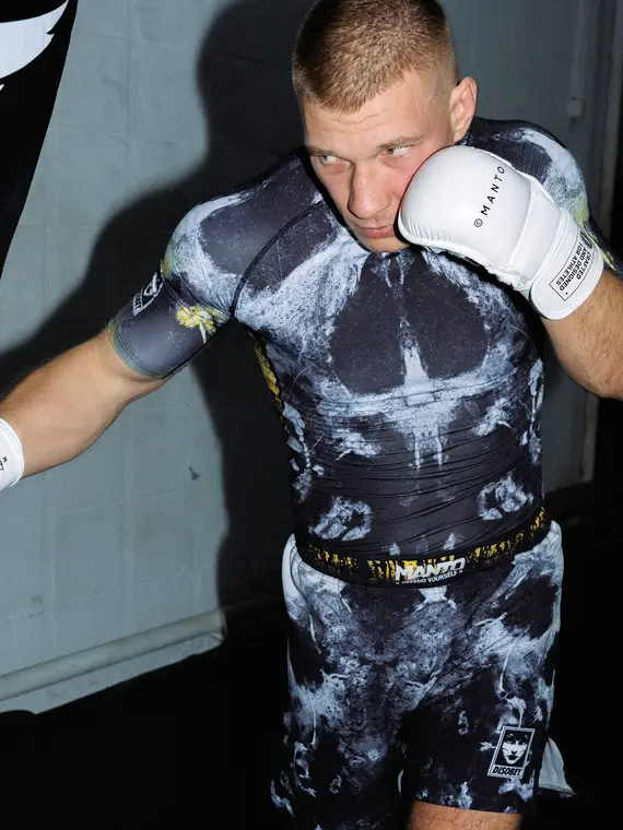 Manto Disobey Rash Guard on a plain background