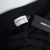 Manto Fight Company Sweatpants on a plain background