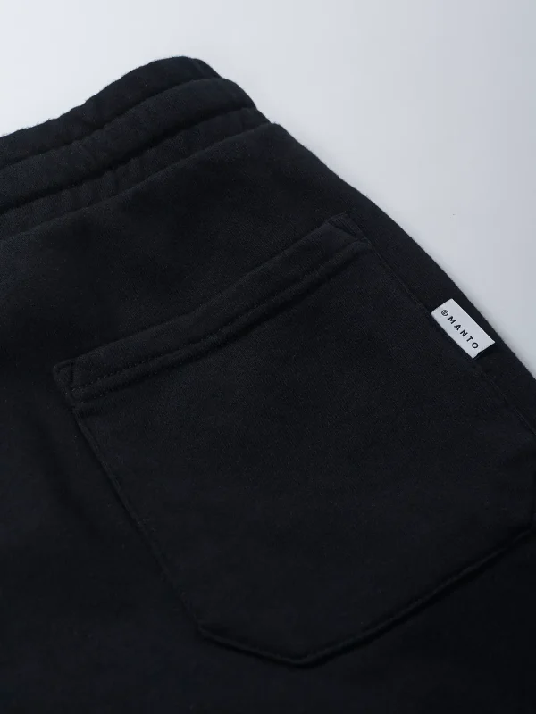 Black Manto Fight Company Sweatpants on a white background