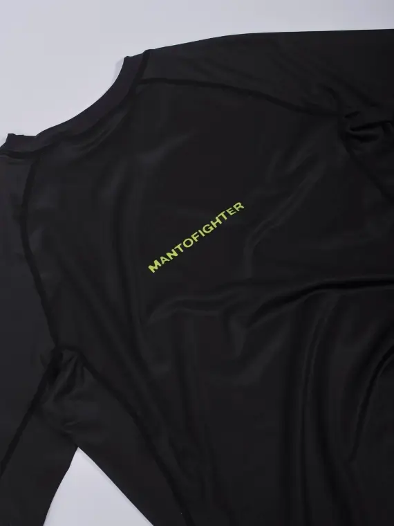 Manto Fighter Rash Guard worn by a male model