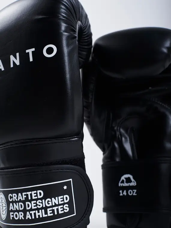 Manto Impact Boxing Gloves Black 1 Manto Impact Boxing Gloves in action