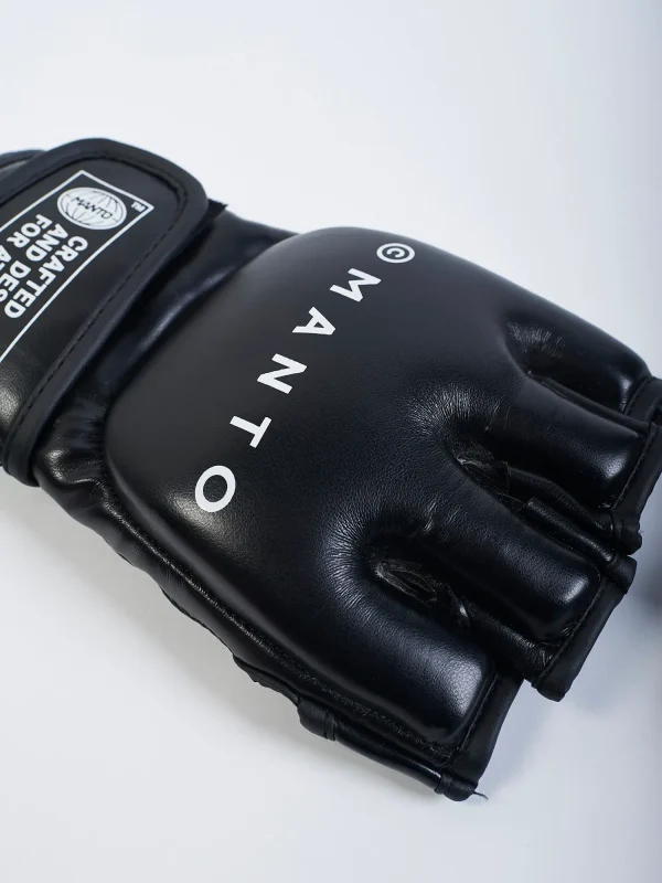 Manto Impact Mma Gloves Black 4 Manto Impact MMA Gloves in action