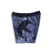 Manto Livings Fight Shorts Grey 1 A pair of Manto Livings Fight Shorts on a white background