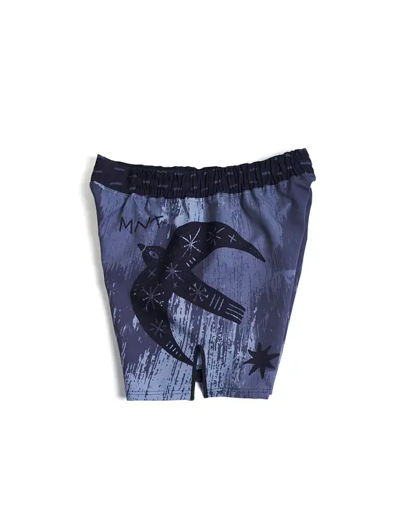 Manto Livings Fight Shorts Grey 1 A pair of Manto Livings Fight Shorts on a white background