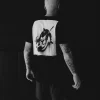 Manto Motion T Shirt Black White 4 Man in a black Manto Motion T-Shirt performing martial arts